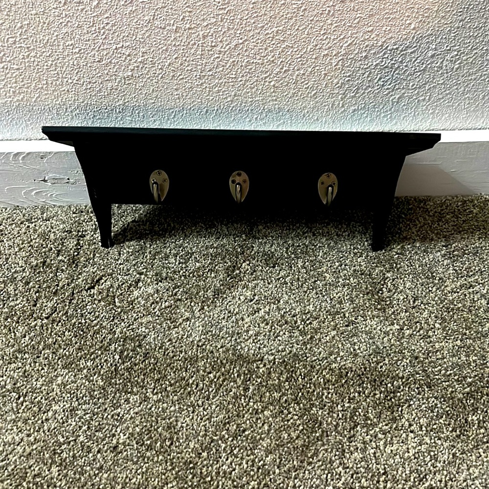 Shelf with hooks
